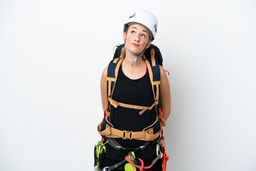 Young caucasian rock climber woman isolated on white background and looking up