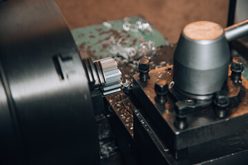 Fototapeta na wymiar Metal processing technology on a vintage metal cutting machine
