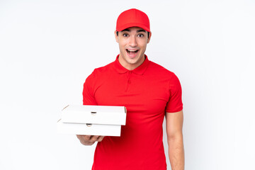 Pizza delivery caucasian man with work uniform picking up pizza boxes isolated on white background...
