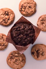 Deurstickers muffin surrounded cookies © Felix Oehler/Wirestock Creators