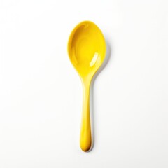 yellow plastic spoon isolated on white background