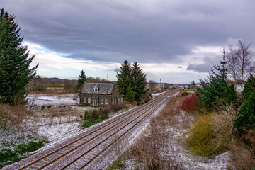 Fototapeta na wymiar Winter railway in Scottish countryside