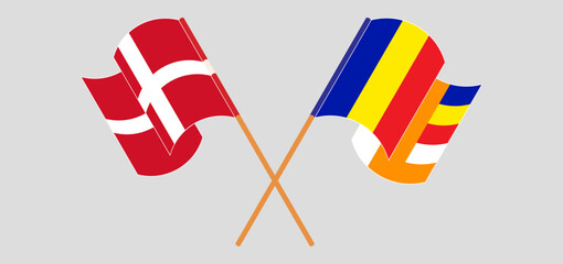 Crossed and waving flags of Denmark and Buddhism