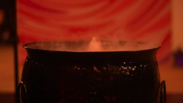 brewing a magic potion in a cauldron