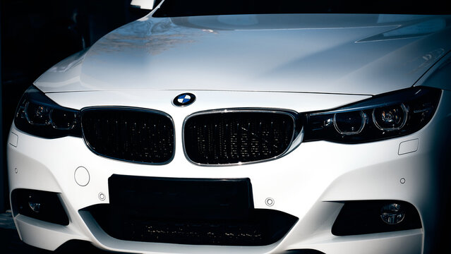 Front view of white BMW 3 series sedan illustrative editorial
