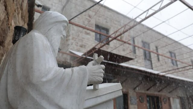 Beautiful view of Saint Charbel Monastery captured on a snowing day in North Lebanon