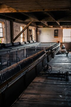 Vertical of an old factory in an old Canadian village in Quebec with many equipment and tools
