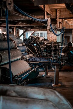 Vertical of an old factory in an old Canadian village in  Quebec with many equipment and tools