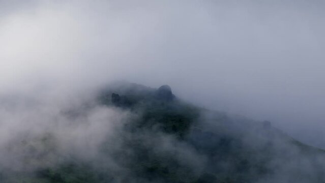Landscape view of a foggy mountain view with camera shake