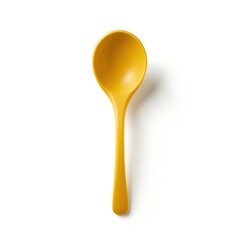 yellow spoon isolated on white