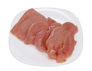 Dietary raw turkey fillet on a plate isolated