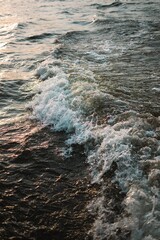 Closeup of sea waves breaking beach