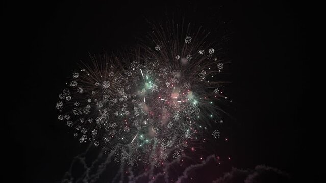 Fireworks at Night. Dark Sky and Colorful Explosion. Festival