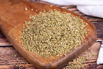 Thyme spice. Wood serving board Dried Thyme leaf. Spice concept.