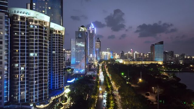 view of modern cityscape of haikou at night