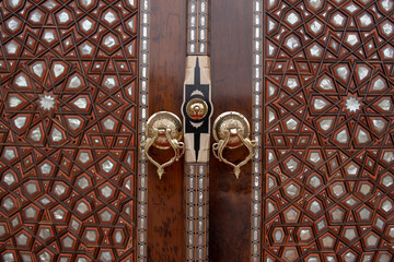 Mother of pearl inlaid wooden door.
Istanbul Eminonu Mosque Gate.
Mother of pearl coating is an...