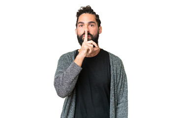 Young man with beard over isolated chroma key background showing a sign of silence gesture putting...