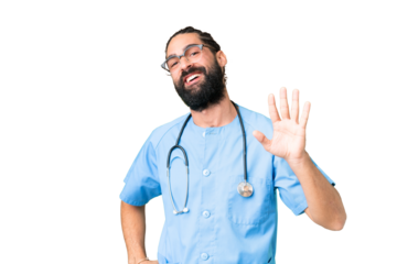 Young doctor man over isolated chroma key background saluting with hand with happy expression