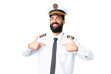 Airplane caucasian pilot man over isolated chroma key background proud and self-satisfied