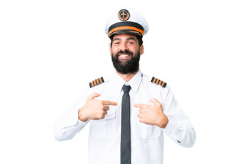 Airplane caucasian pilot man over isolated chroma key background with surprise facial expression