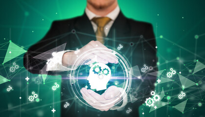 Businessman holdig business icons concept