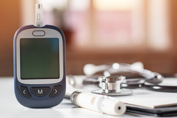 Glucometer and Syringe for Sugar Diabetes Monitoring with Copy Space