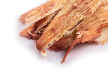 Pieces of peruvian squid close up on white background. snack for beer.