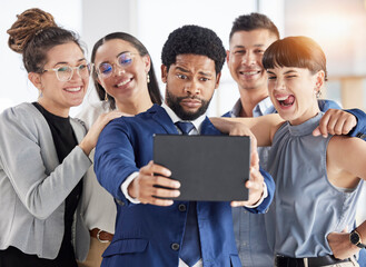 Fototapeta premium Selfie, happy and business people together with a tablet for team building and group fun. Funny, smile and a black man taking a photo with employees or friends on technology for an office memory