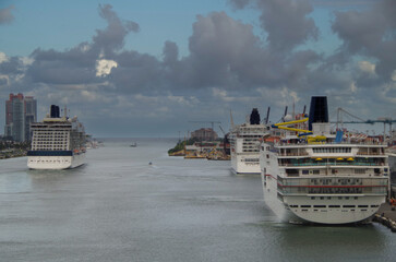 Cruiseships or cruise ship liners Sensation, Jade and Equinox during misty twilight in port of...