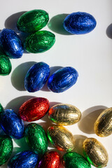 card mockup and colorful chocolate eggs for easter
