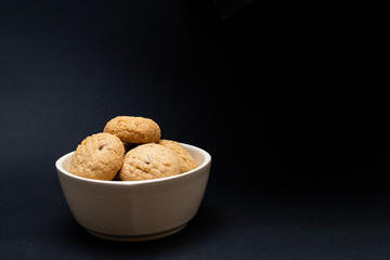 A  bowl full of plain Kahk with no sugar (traditional Arabian cookies), celebration feast after Ramadan, holy month
