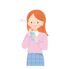 楽しそうにスマホの画面を見る若い女性