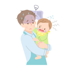 泣いている赤ちゃんを抱っこするエプロン姿のパパ