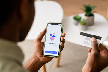 Crop person using smartphone in office