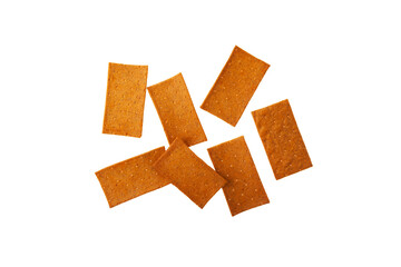 Crispy rye bread. Crisps with paprika on white background, top view. Design element, copy space....