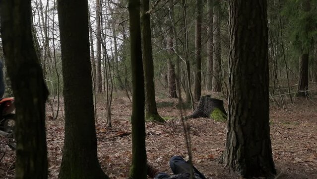 Fell off a motorcycle, two guys riding a motorcycle passenger clings to a tree and falls