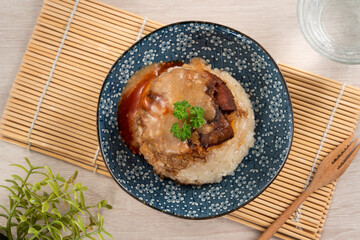 Migao, tube rice cake, rice pudding in a bowl, delicious Taiwanese street food.