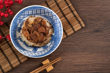 Fototapeta na wymiar Migao, tube rice cake, rice pudding in a bowl, delicious Taiwanese street food.