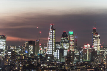 night view of the city of London with illuminated buildings