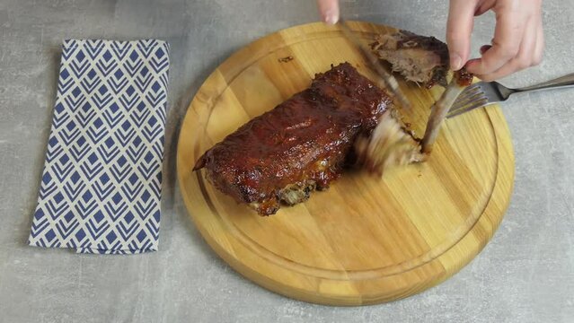 Roasted Beef Rib totating in a wooden board