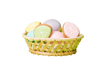 Basket of colorful Easter eggs isolated on white background. Easter basket filled with colored eggs top view holiday concept