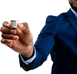 Mid section of african american businessman holding a bulb screw base against white background