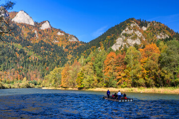 Rafting down the Dunajec River in the autumn scenery of the Pieniny Mountains. Poland