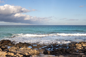 Fototapeta na wymiar Rocky coast of Atlantic ocean, Fuerteventura, Spain