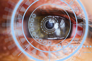Close-up of a male eye with visual effects. The concept of a sensor implanted in the human eye. Business, computer, cyberspace.
