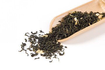 dry jasmine scented tea leaves  isolated on white background