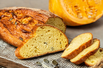 pumpkin bread on wooden board, banner, menu, recipe place for text, top view