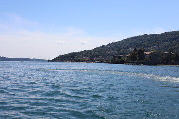 Fototapeta premium Scenic view of Lake Maggiore and the island of Isola Bella. Beautiful Italian landscape.