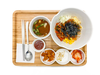 Korean food on a tray on a white background ramen kimchi top view