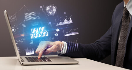 Businessman working on laptop, business concept